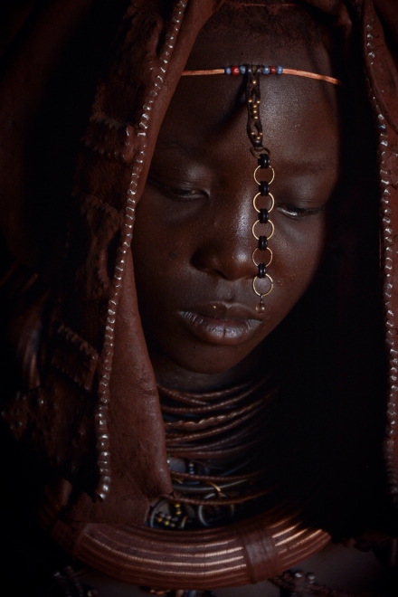 Young Himba showing me her bridal veil